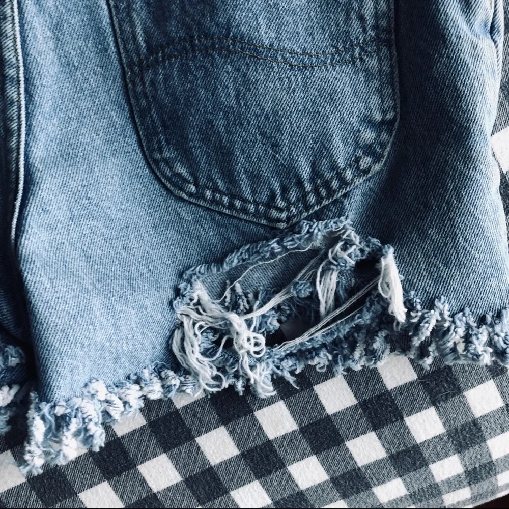 Lee Hand-made distressed denim shorts